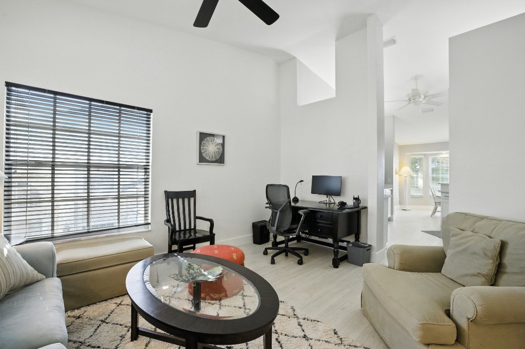 Bonus room with private office desk and seating at Pinnacle, Unit 2503 Naples FL luxury vacation rental