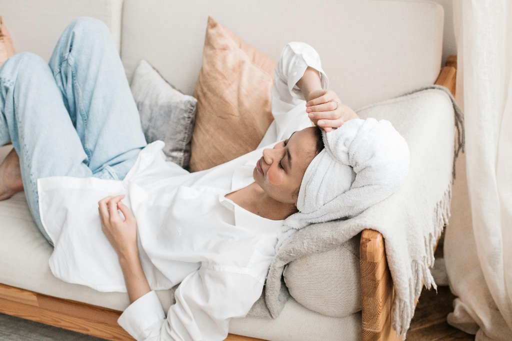 Woman relaxing on sofa