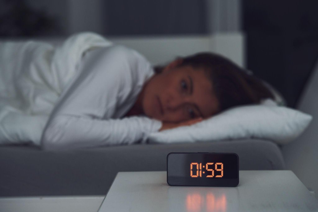 Woman lying awake at night
