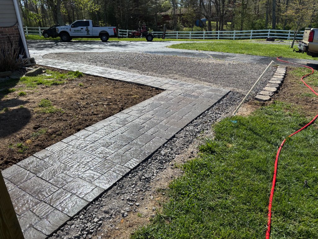 Paver walkway installation with gravel border