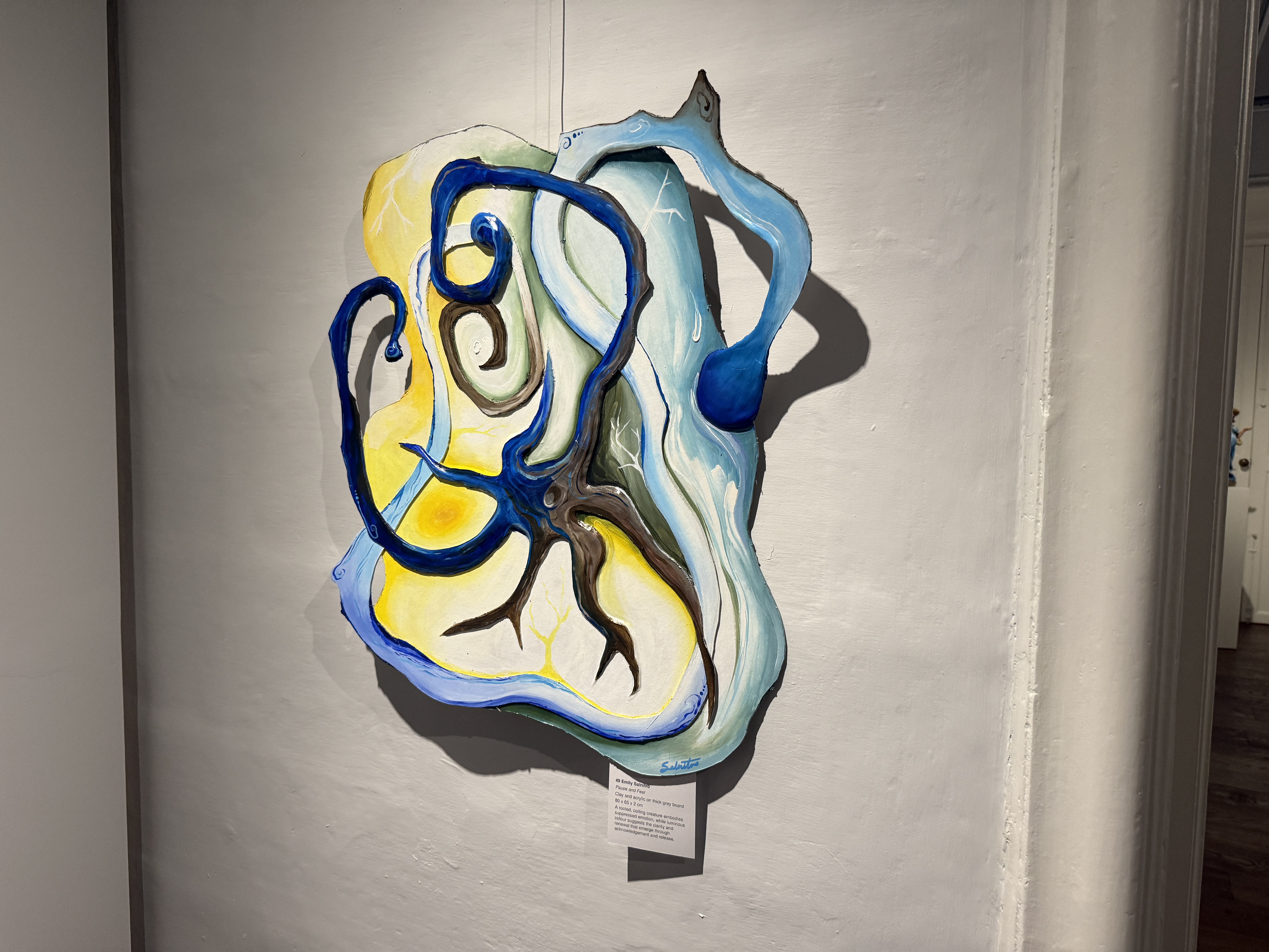 Emily Salnitro — Pause and Feel, clay and acrylic on thick grey board. KIND | STRANGE | BEAUTIFUL exhibition, Malta Society of Arts, Palazzo de La Salle, Valletta