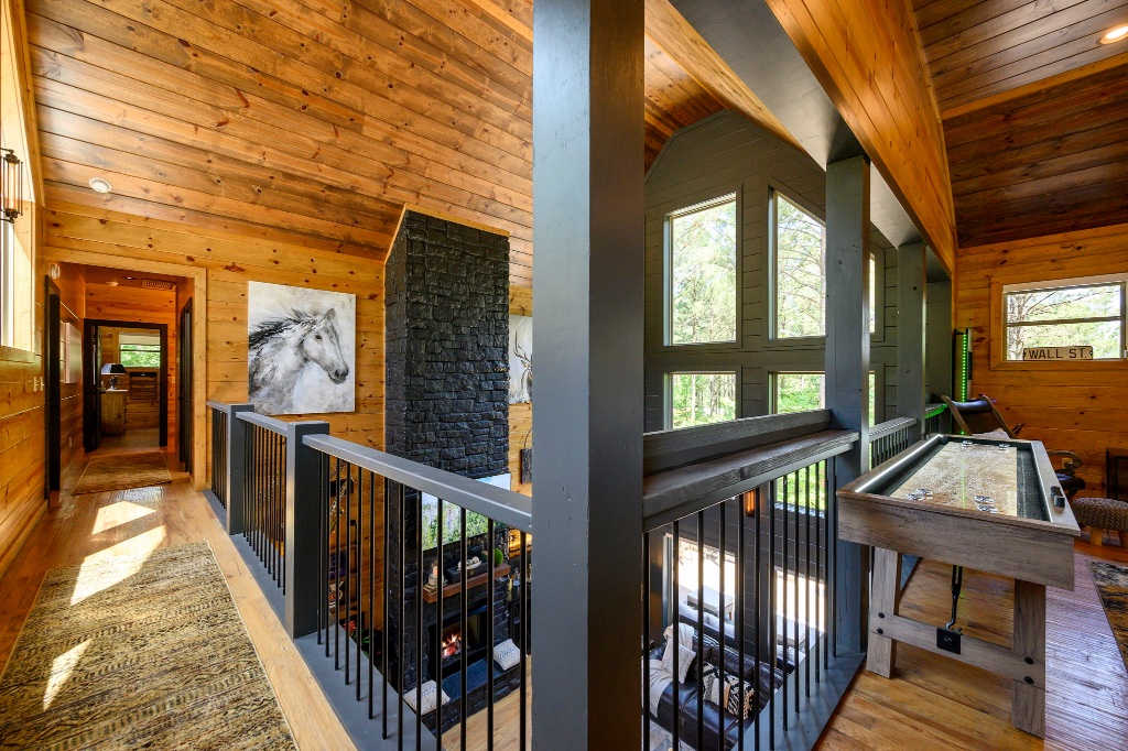Game Loft - Shuffleboard & Stone Fireplace