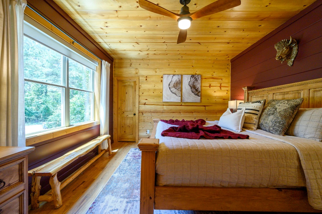 Buffalo Room - Bed with Buffalo Head Wall Mount