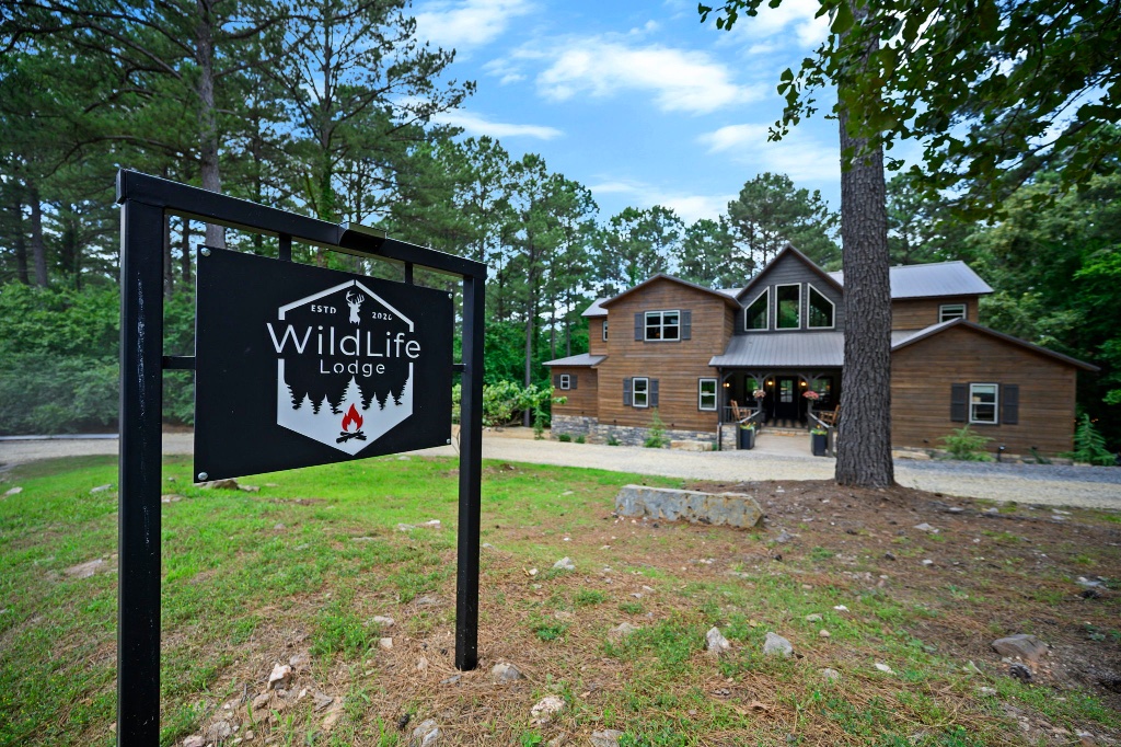 Front Exterior - Lodge & Gravel Driveway