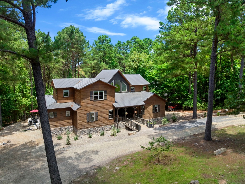 Front Exterior - Two-Story Lodge with Bridge Entry
