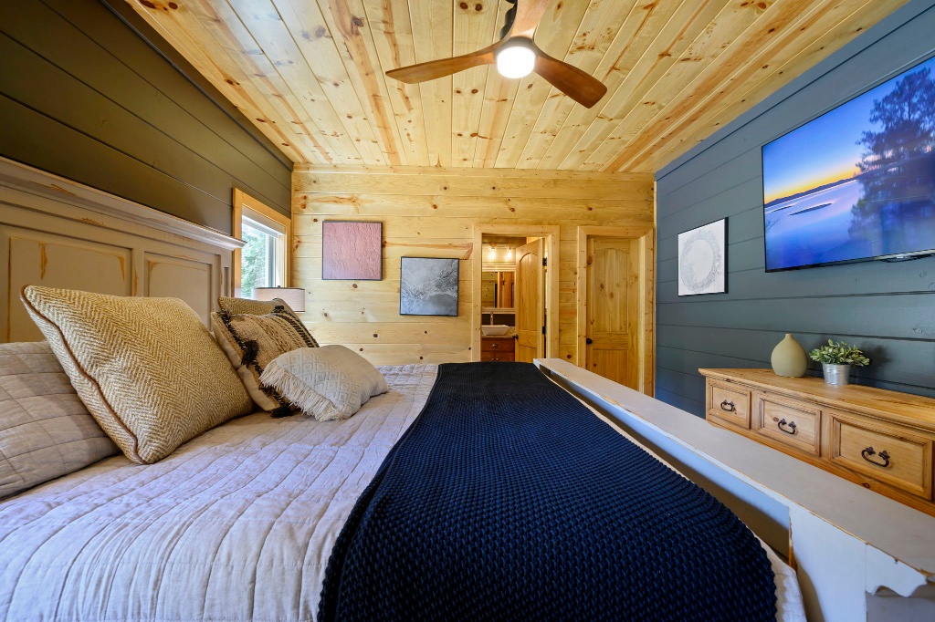 Squatch Room - TV on Dark Shiplap Wall