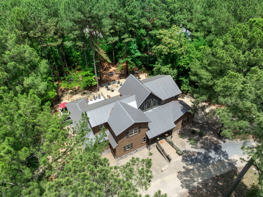 Aerial View - Lodge Nestled in Dense Forest
