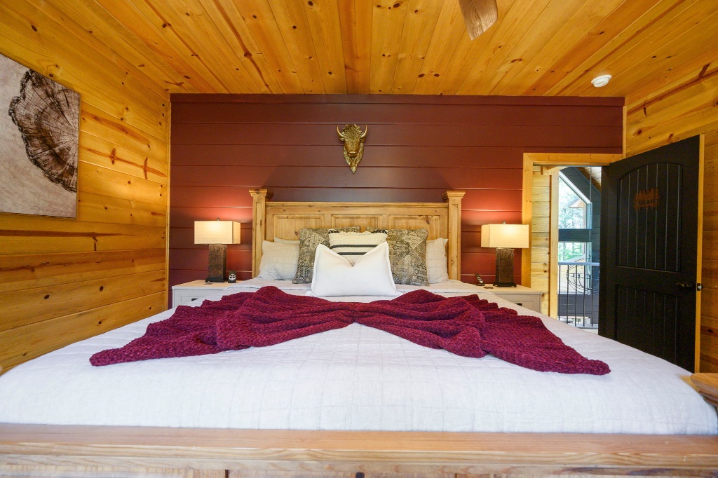 Buffalo Room - Maroon Throw & Balcony Door