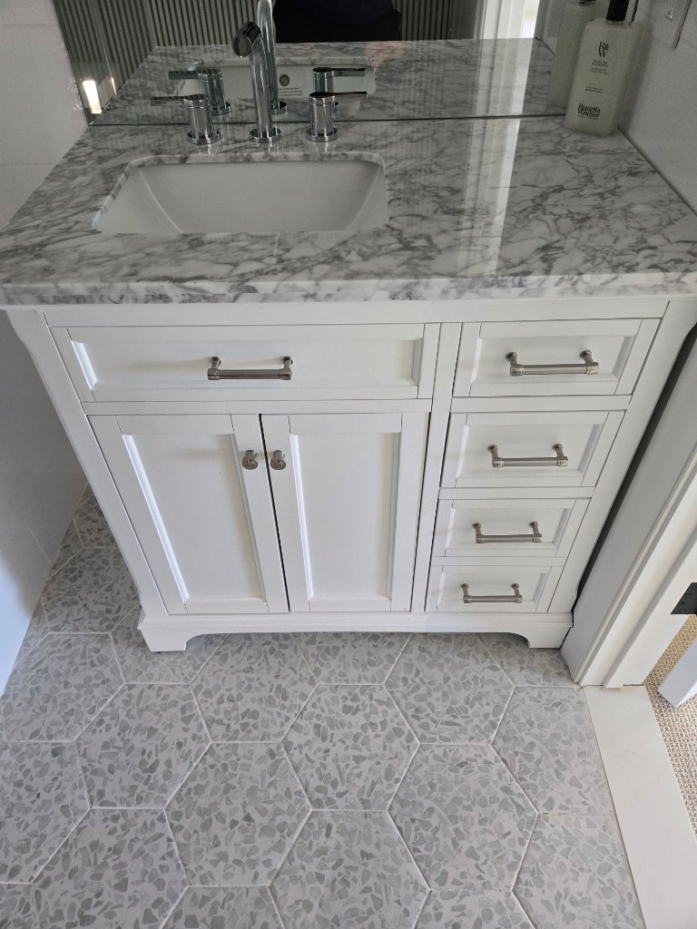 Custom vanity with marble countertop