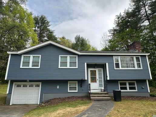 Slate blue siding installation on a residential home
