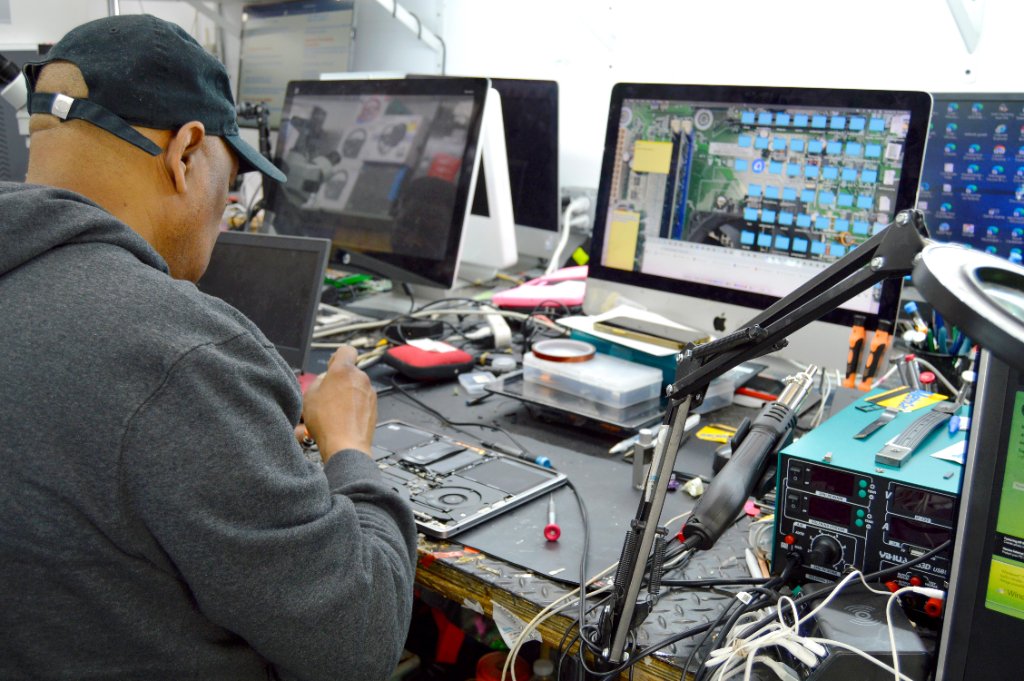 Computer repair specialist at work