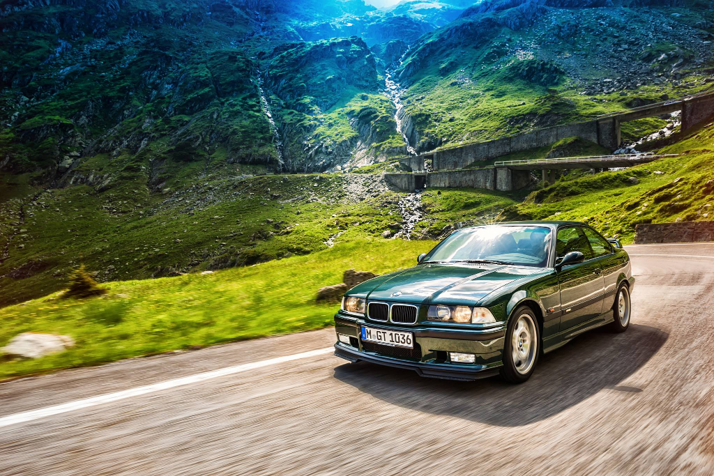 British Racing Green BMW E36 M3 GT on a mountain road