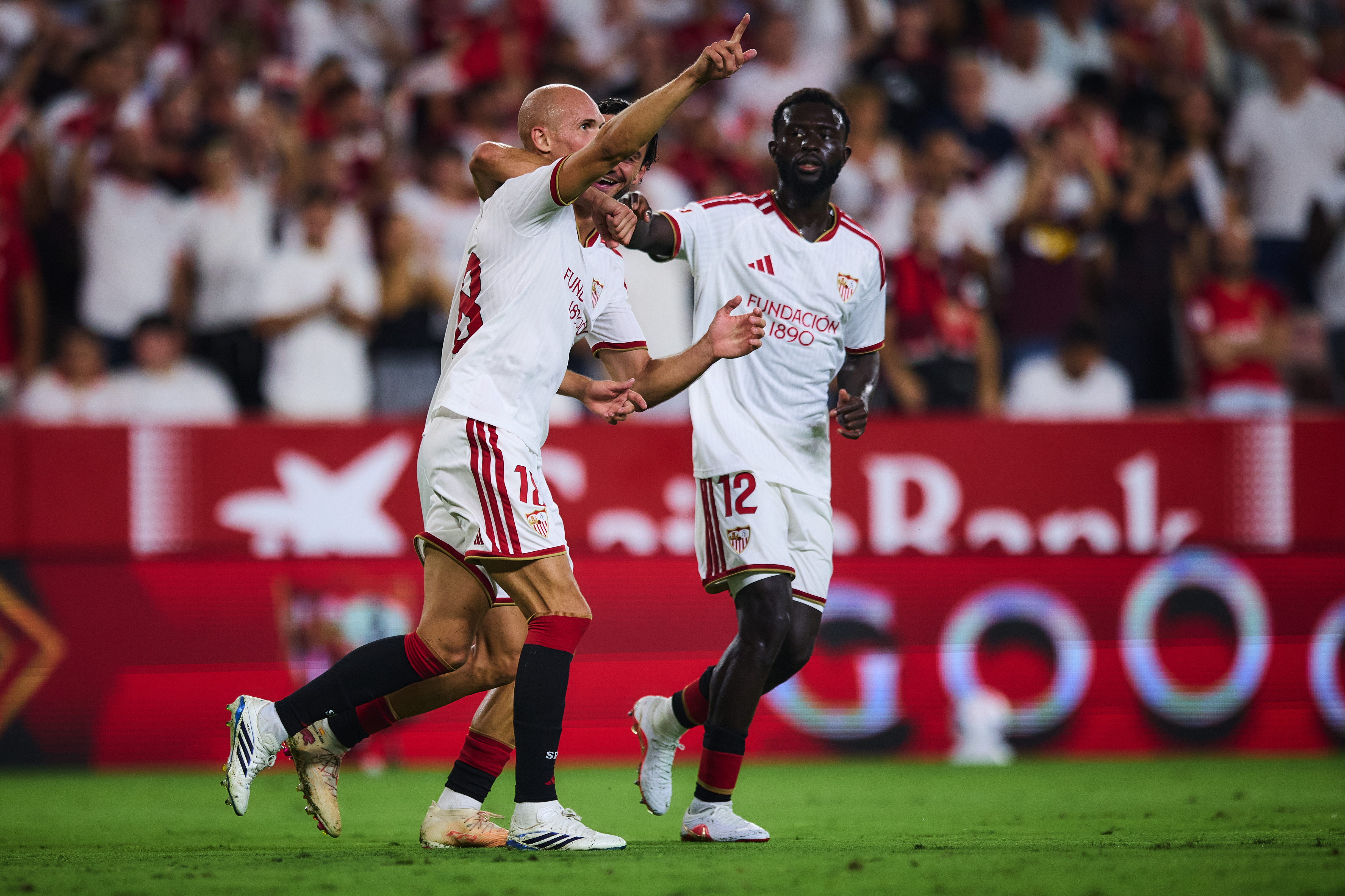 Sevilla FC players celebrating a goal