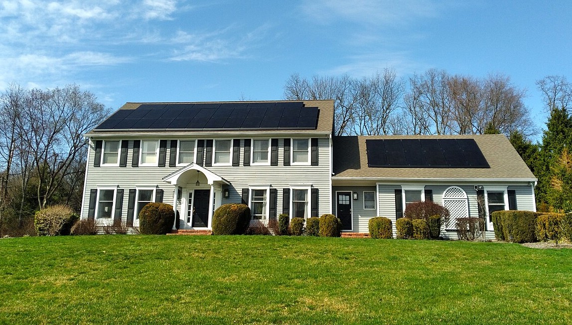 Completed AllSeason Solar installation on a New Jersey home with dual roof-mounted solar arrays