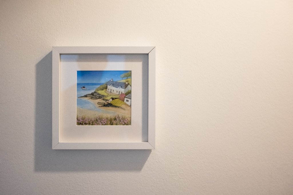 Framed coastal artwork