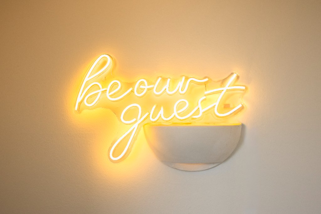 Be our guest neon sign