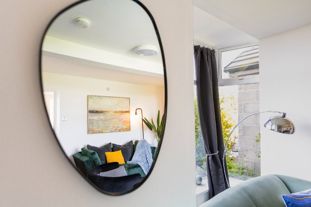 Mirror reflection of living room