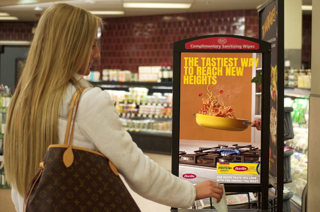 In-store DOOH kiosk with CPG brand ad