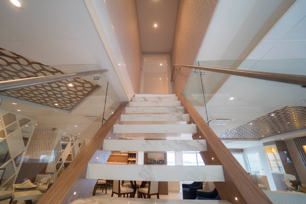 Interior stairway aboard M/C Elite
