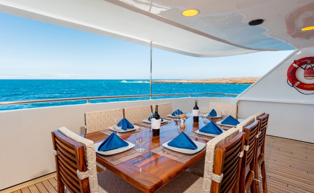 M/C Ocean Spray interior dining room with set tables
