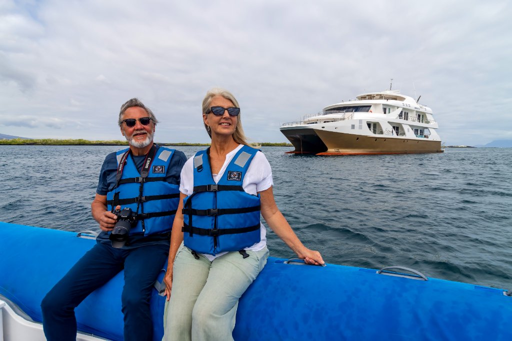 M/C Elite sky deck lounge with sunbeds and open Galapagos views