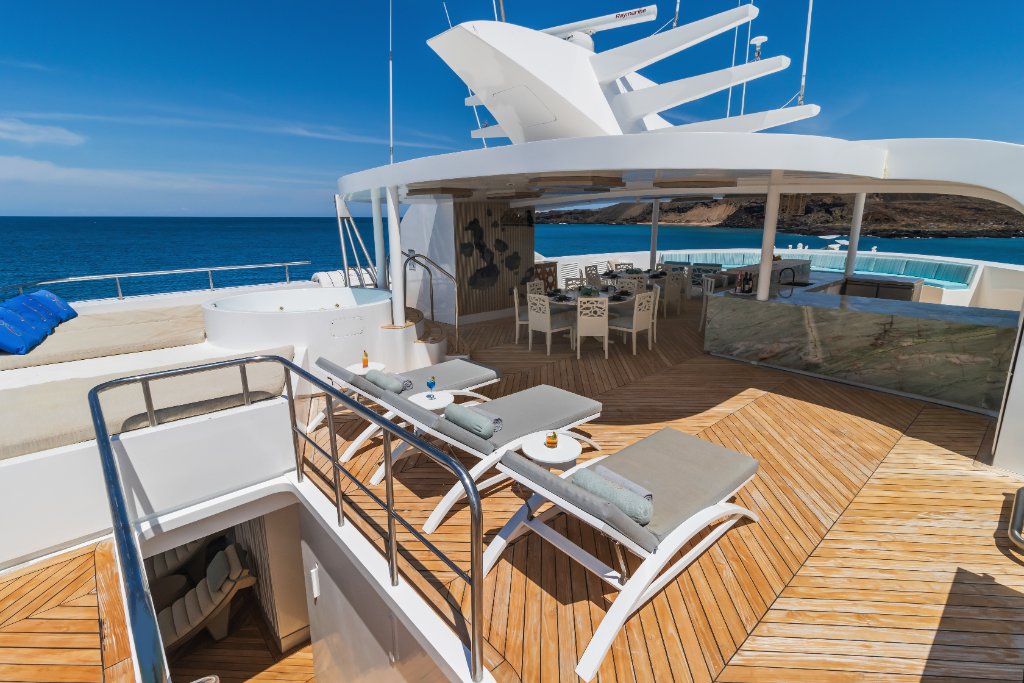 Outdoor deck seating aboard M/C Elite