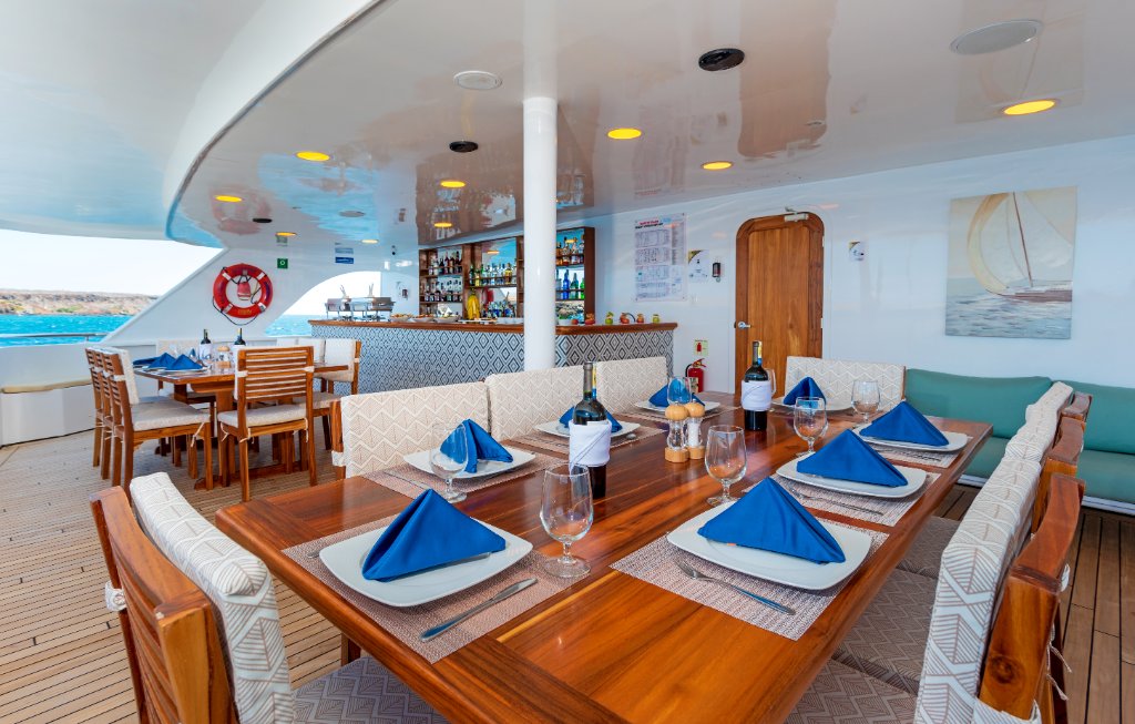 M/C Ocean Spray naturalist guide briefing guests in the lounge