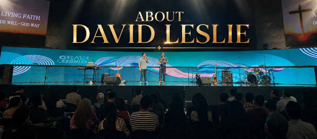 David Leslie speaking on stage at an international conference