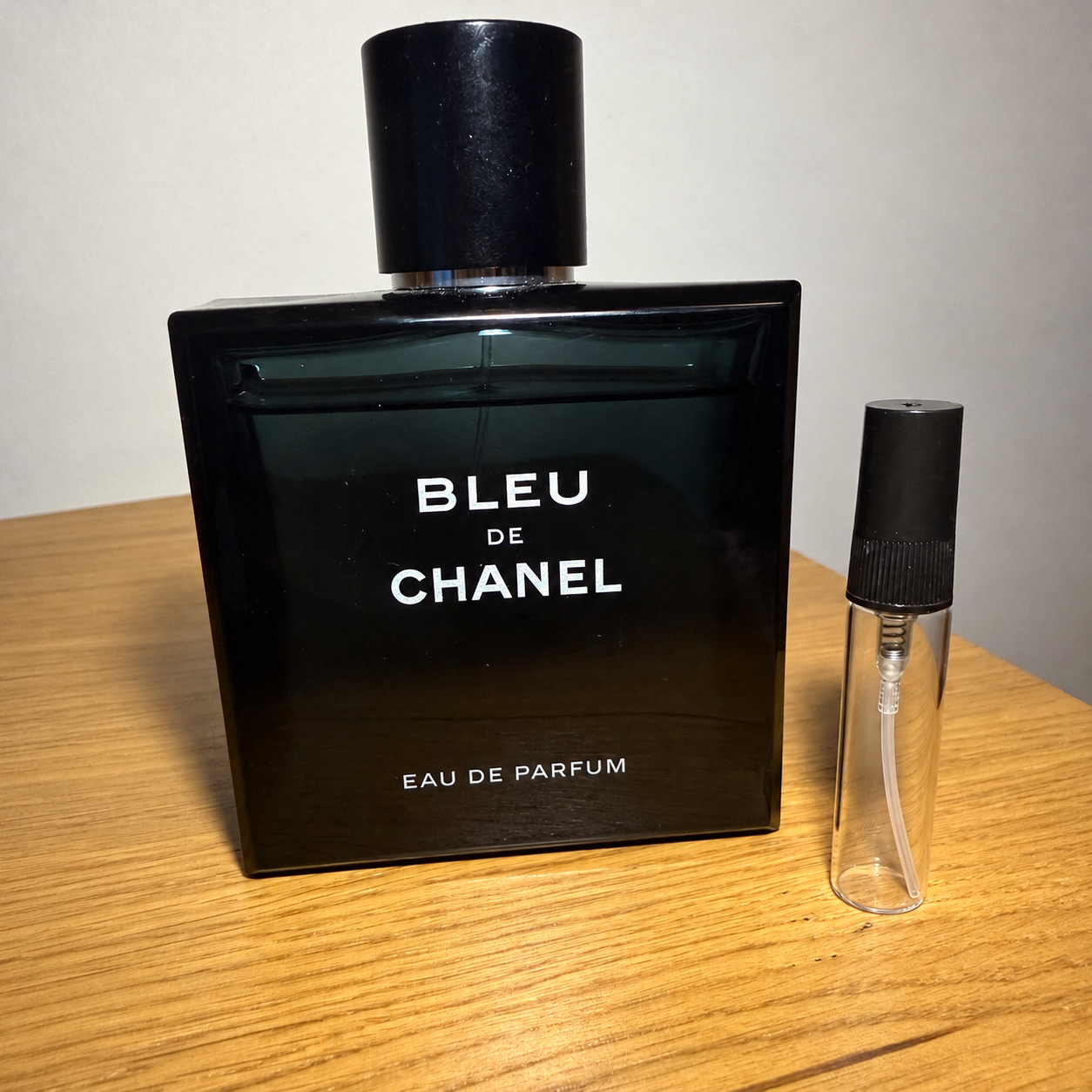Chanel Bleu de Chanel EDP 5ml sample atomiser beside the retail bottle