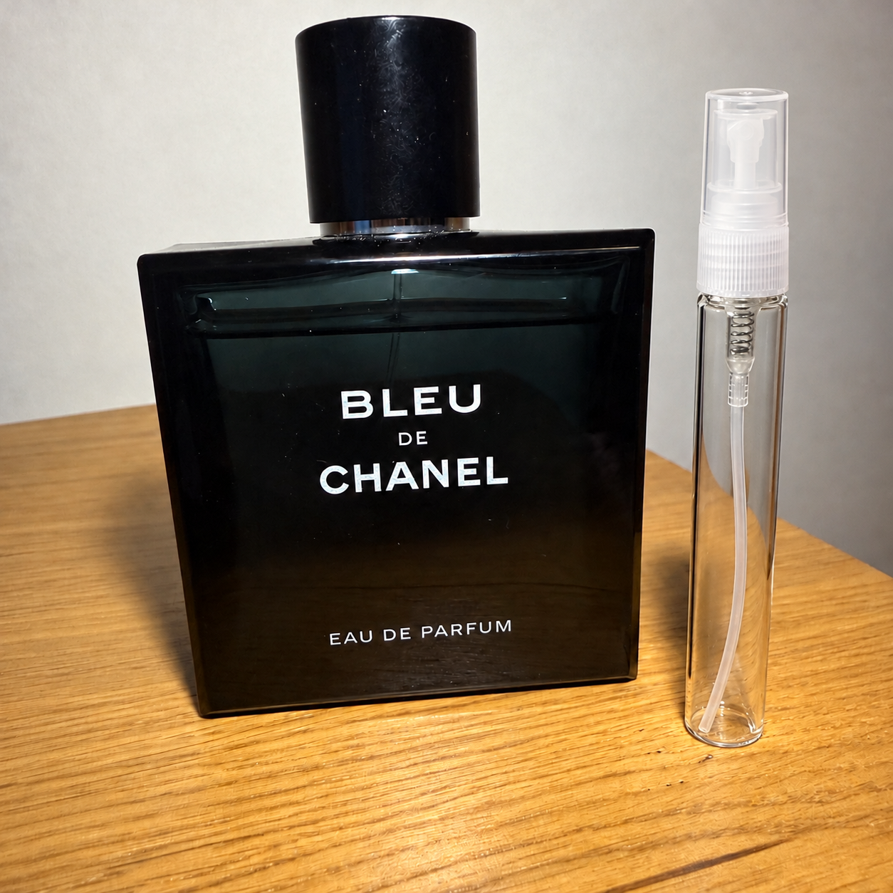 Chanel Bleu de Chanel EDP 10ml sample atomiser beside the retail bottle