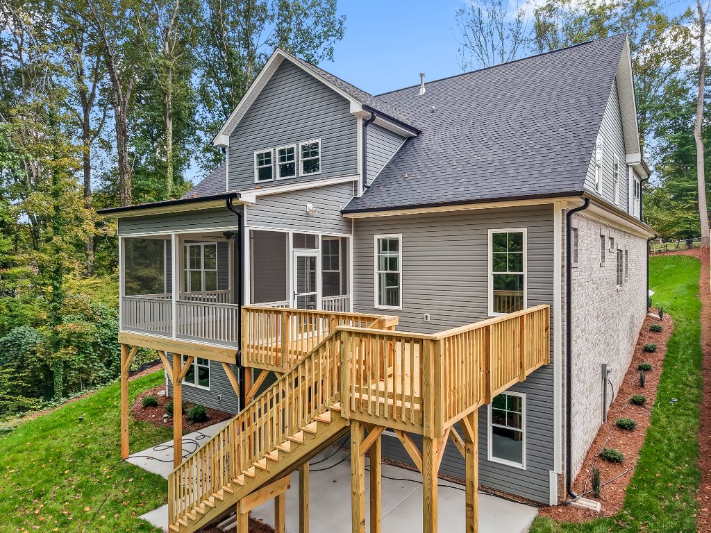 Rear of home with deck