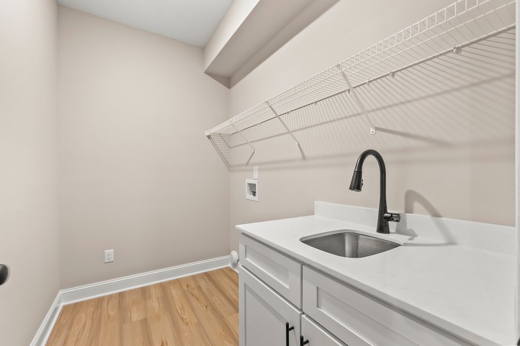 Laundry room with sink