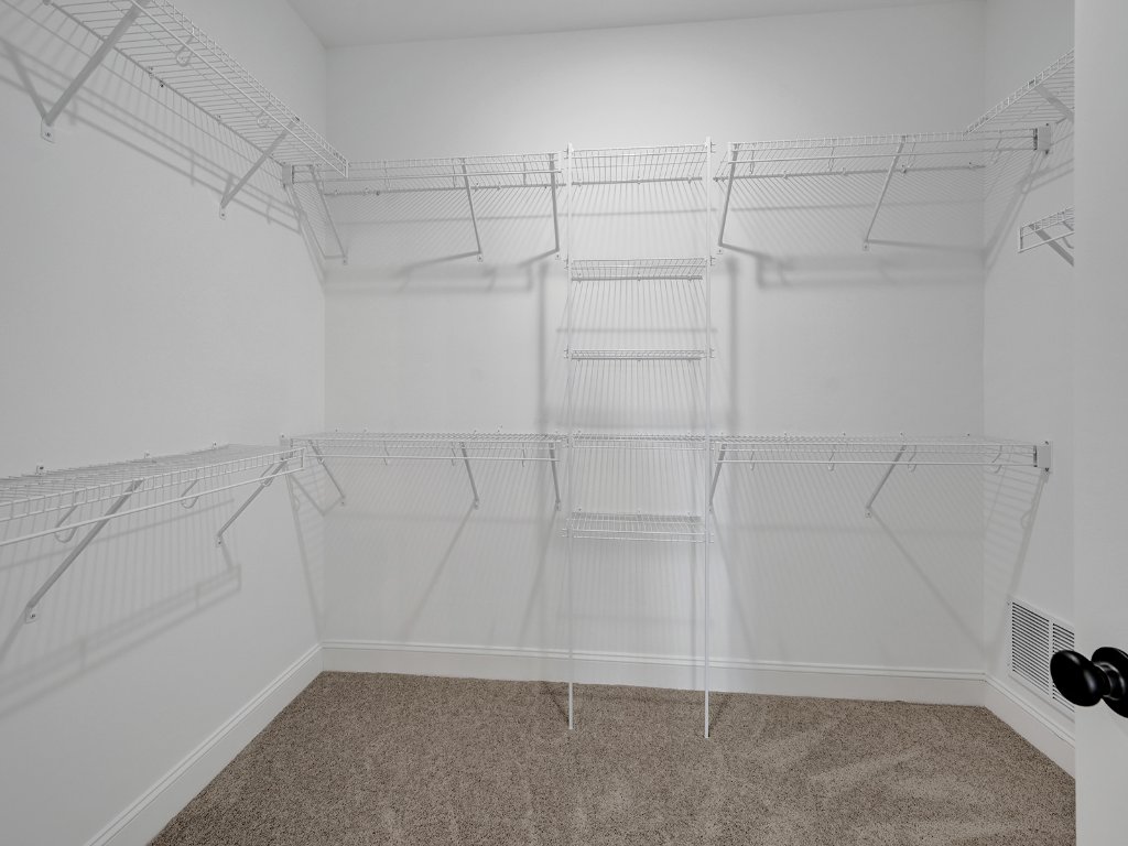 Primary walk-in closet