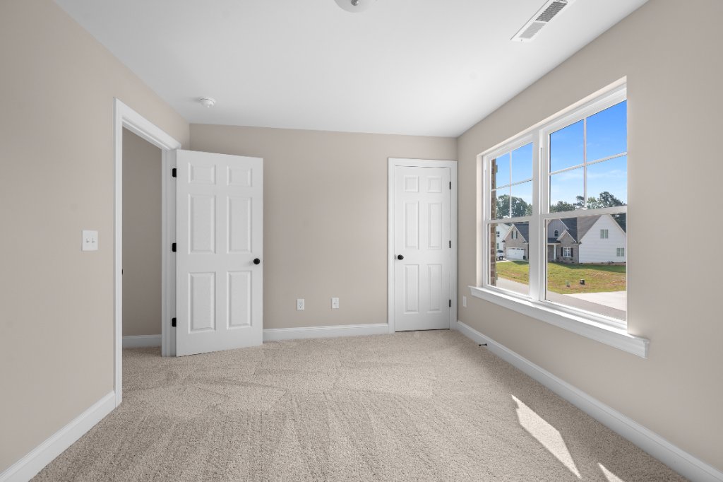 Bedroom with carpet
