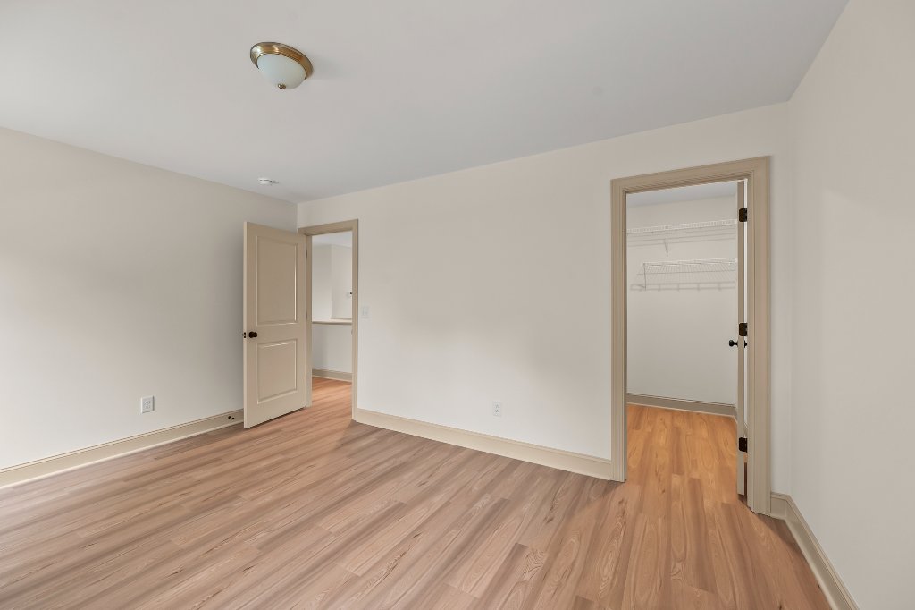 Secondary bedroom with walk-in closet