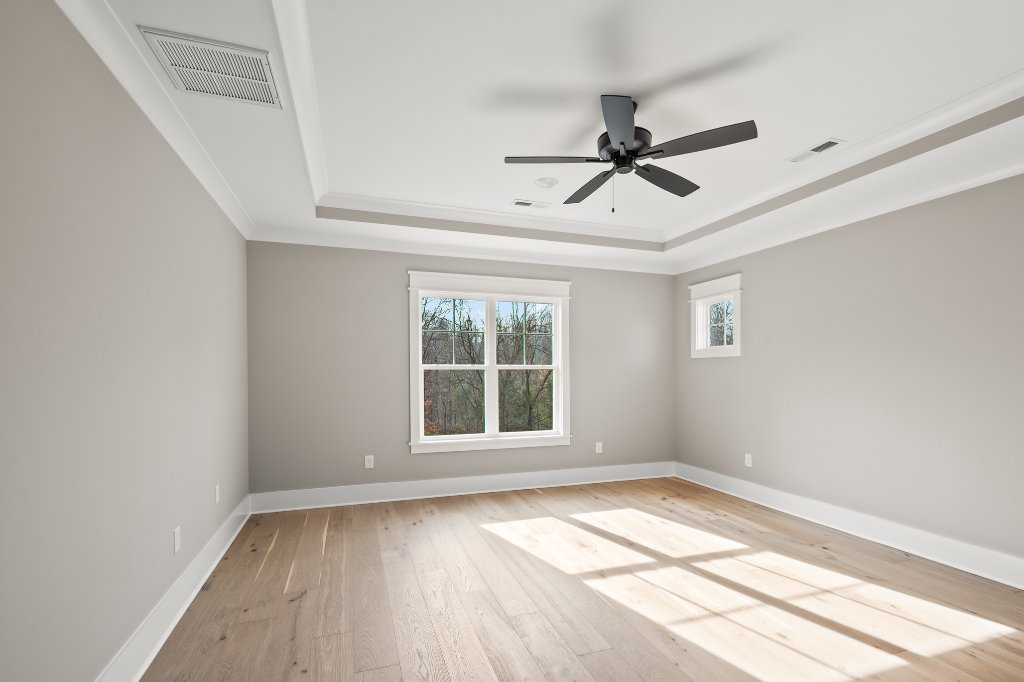 740 Surrey Path Trail, primary bedroom with tray ceiling