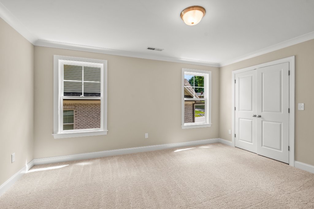 Upstairs bedroom with closet