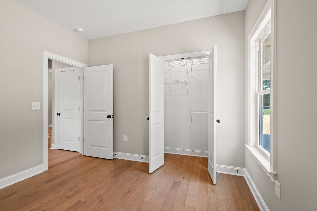 Bedroom with walk-in closet