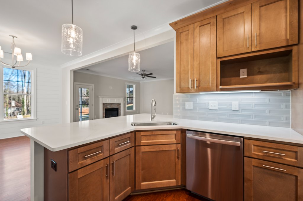 555 Alpine Rd. Kitchen sink open to family room.