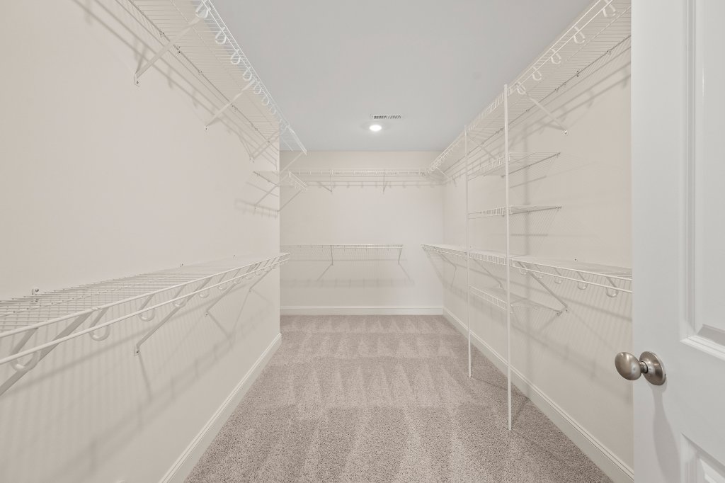 360 Wynnfall Drive, primary bedroom with ceiling fan