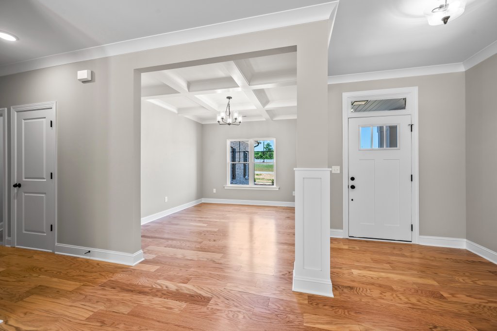 132 Cricket's Run, foyer with coffered ceiling dining room