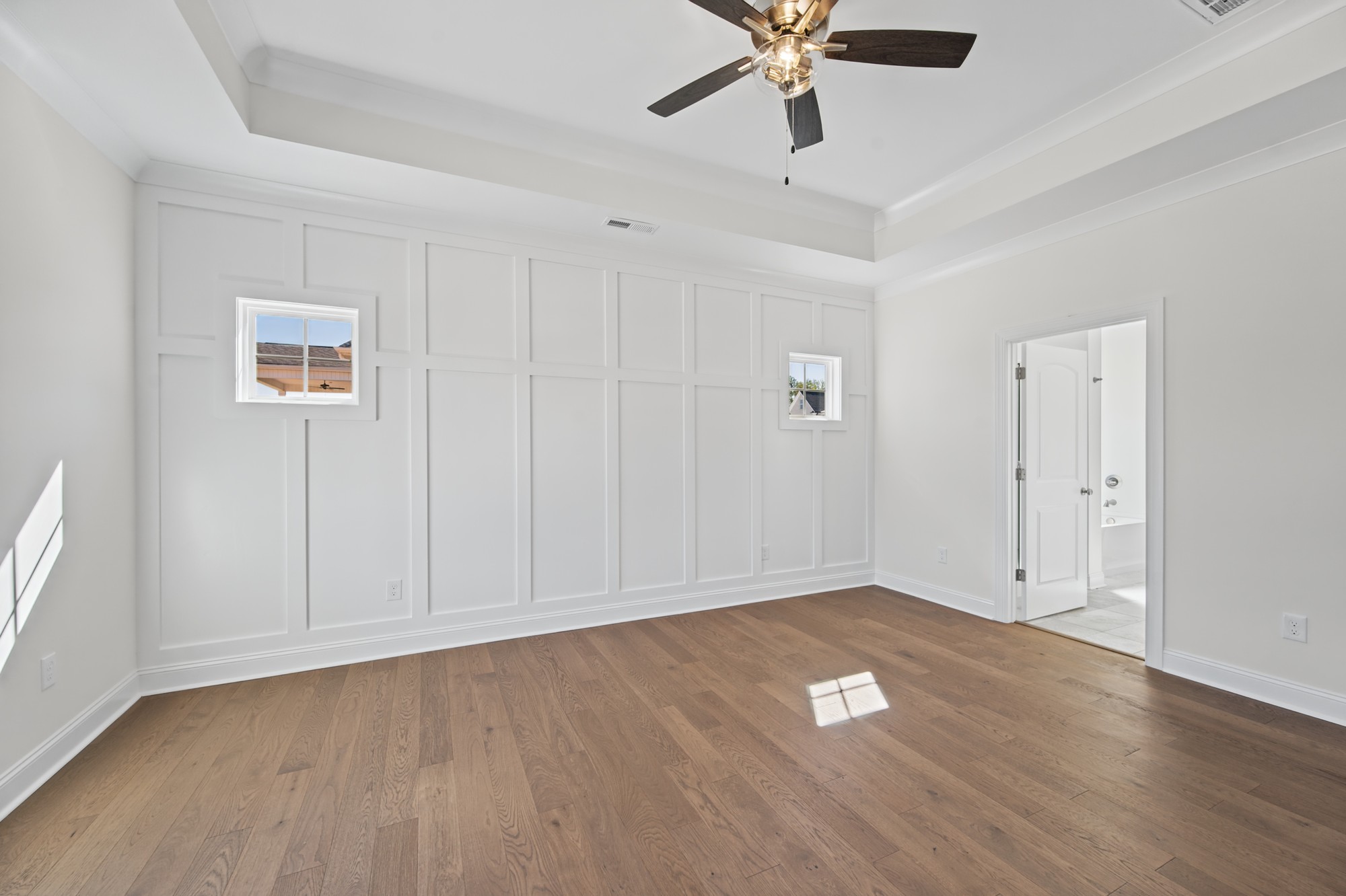 250 Cool Run - Primary Bedroom with Tray Ceiling & Wainscoting