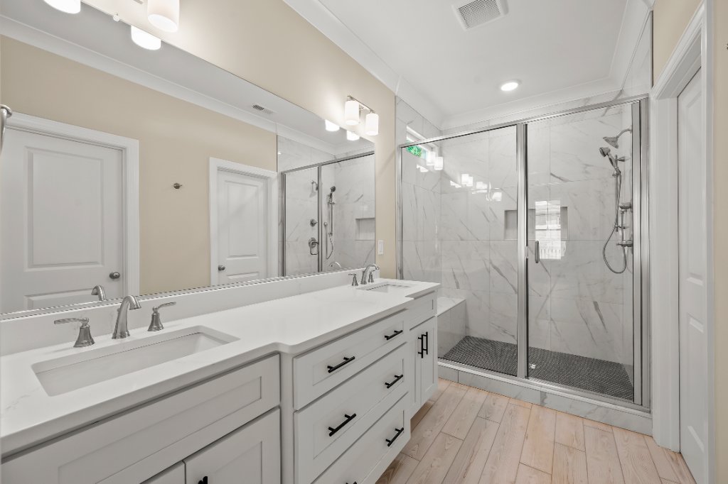 Primary bath with double vanity and walk-in shower