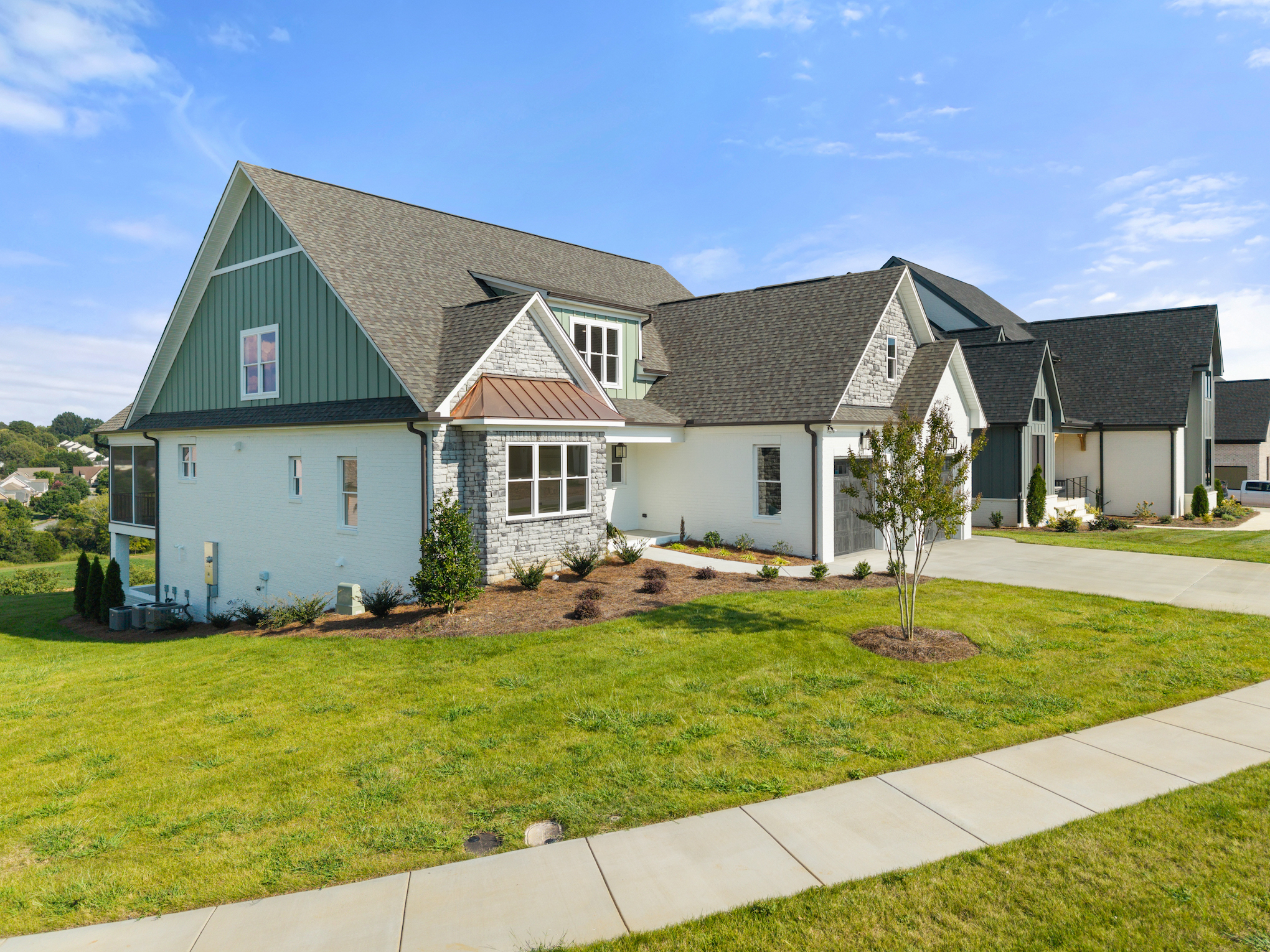 727 Royal Jasmine Ct - Side Exterior with Stone Accents