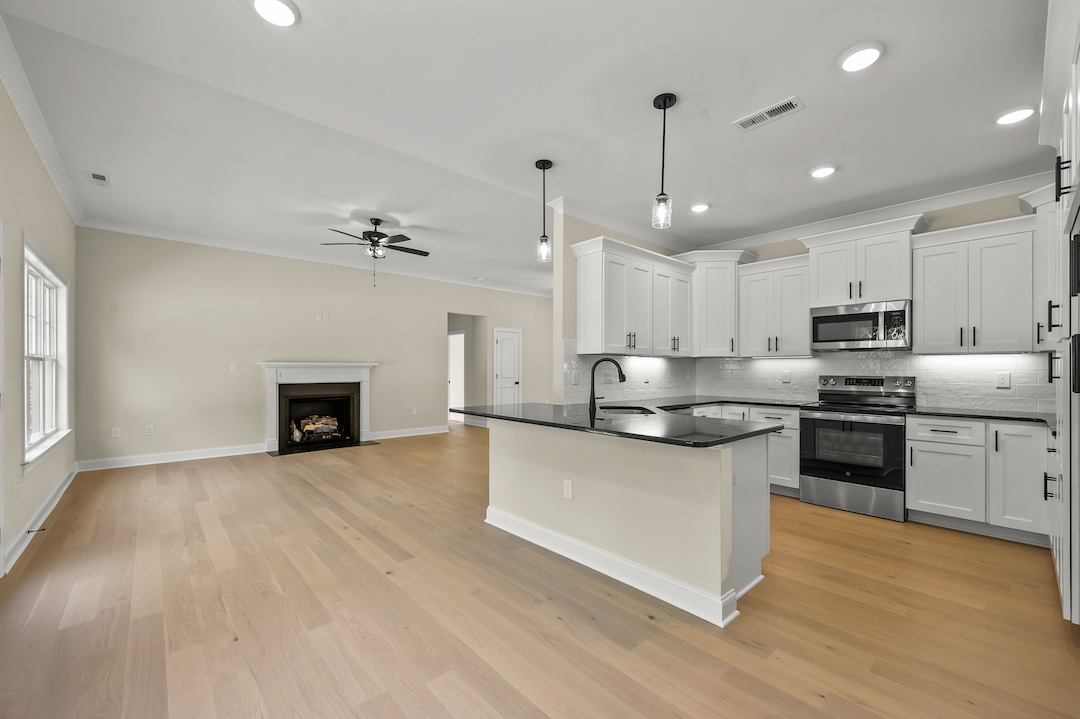249 Cool Run - Kitchen with Island & Fireplace View