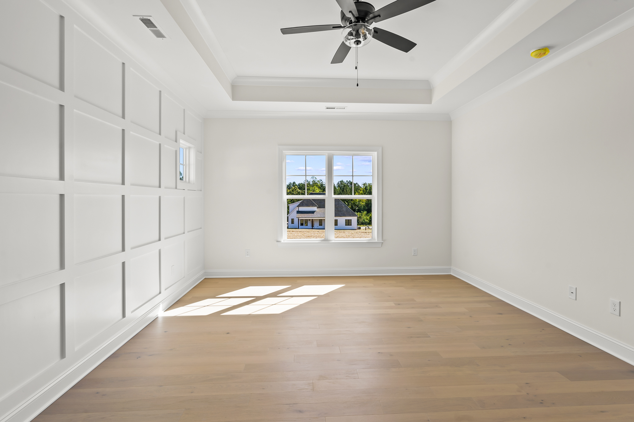 192 Cool Run - Primary Bedroom with Paneled Wall