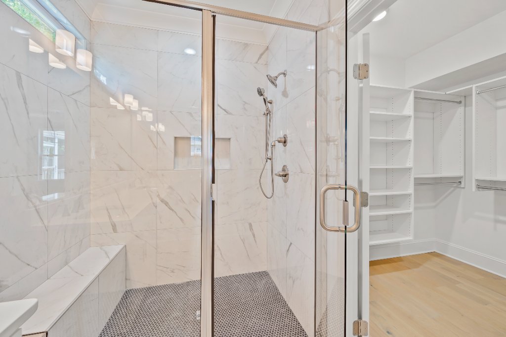 Primary shower and walk-in closet