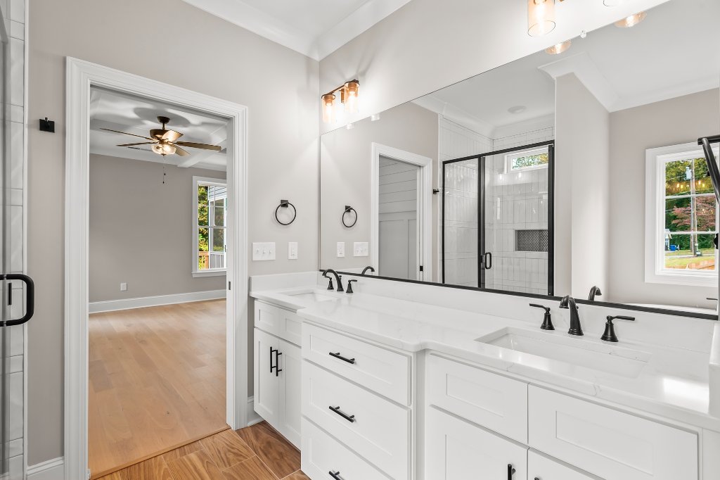 Primary bathroom vanity and shower