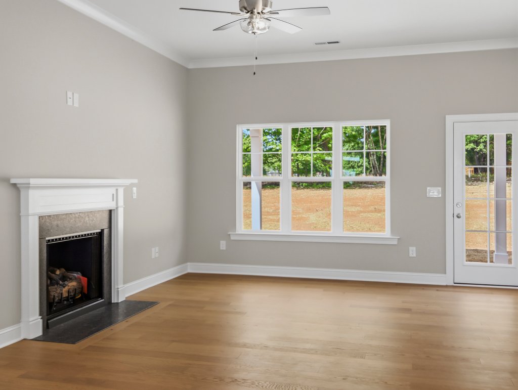 173 Cool Run, great room fireplace and rear door