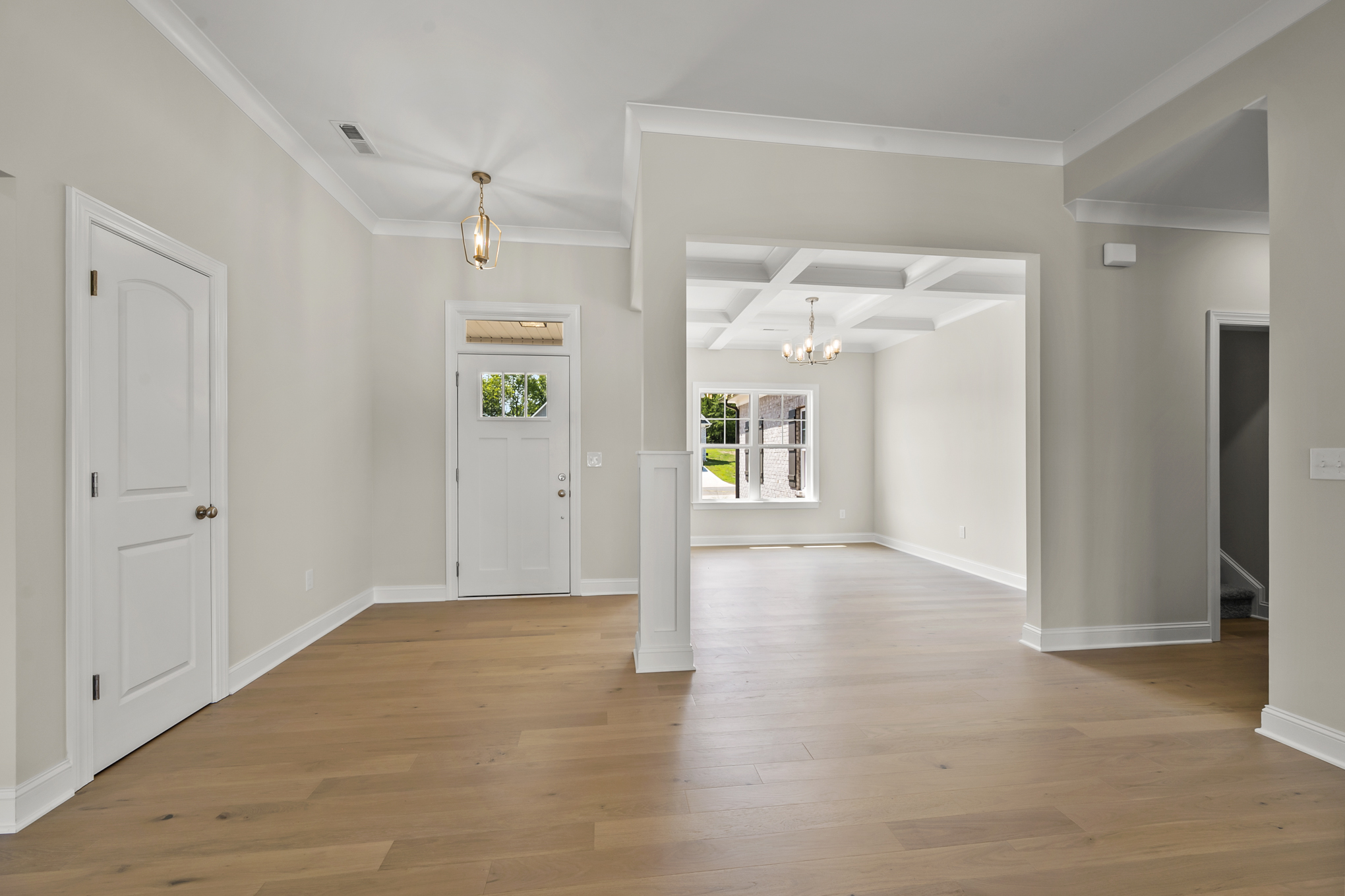 174 Cool Run - Foyer with Coffered Ceiling Dining Room